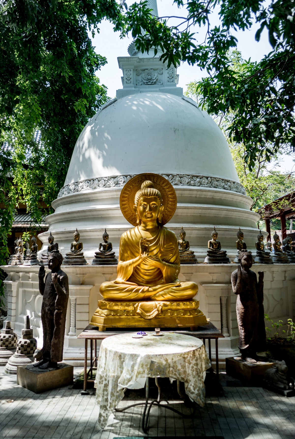 Buddha statue in Gangaramaya temple, Colombo Sri Lanka