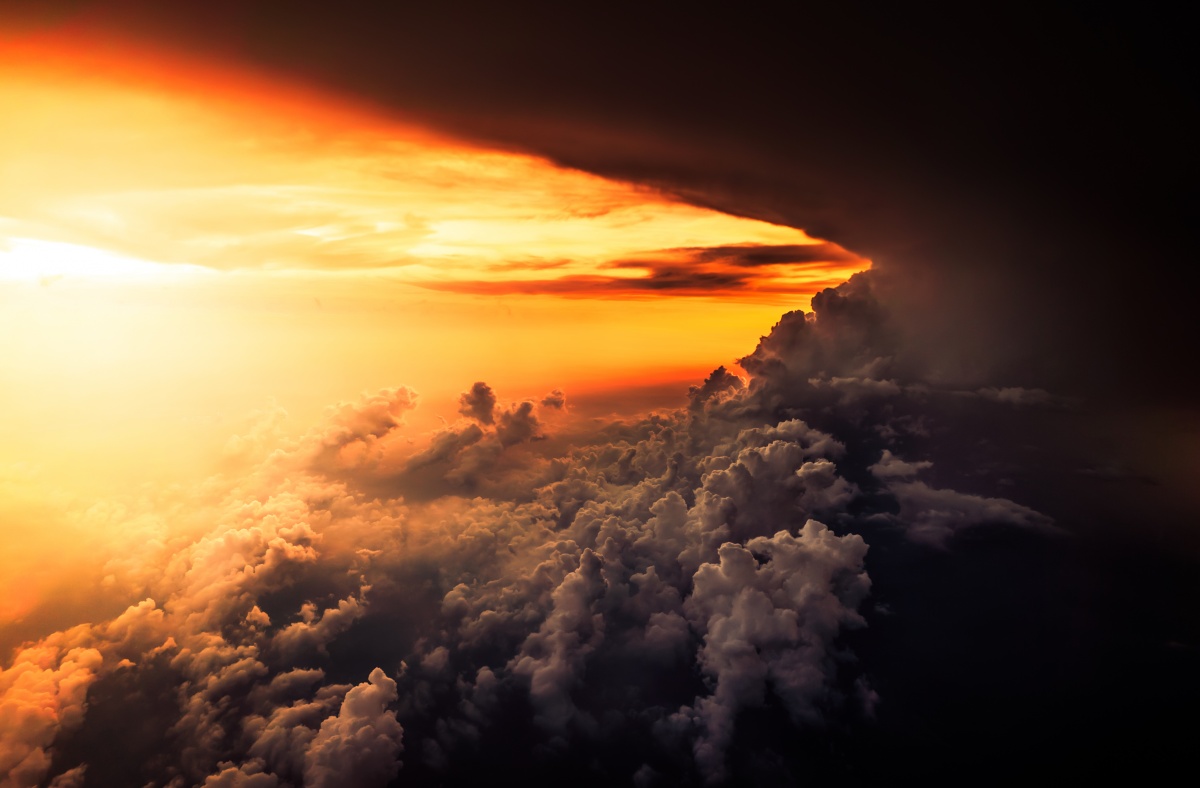 Photo of epic sunset and insane cloud formation rising from the sea.