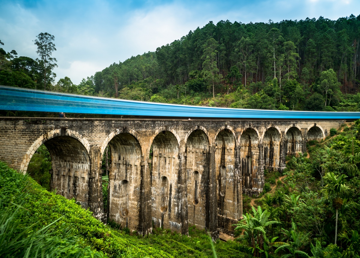 Photo of nine arch bridge and train crossing shot with 8 second shutter speed