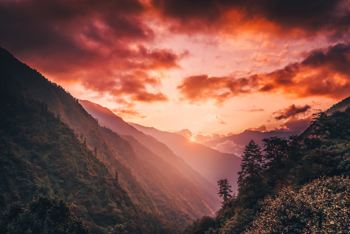 Photo of beautiful red sunset in Himalayan river valley