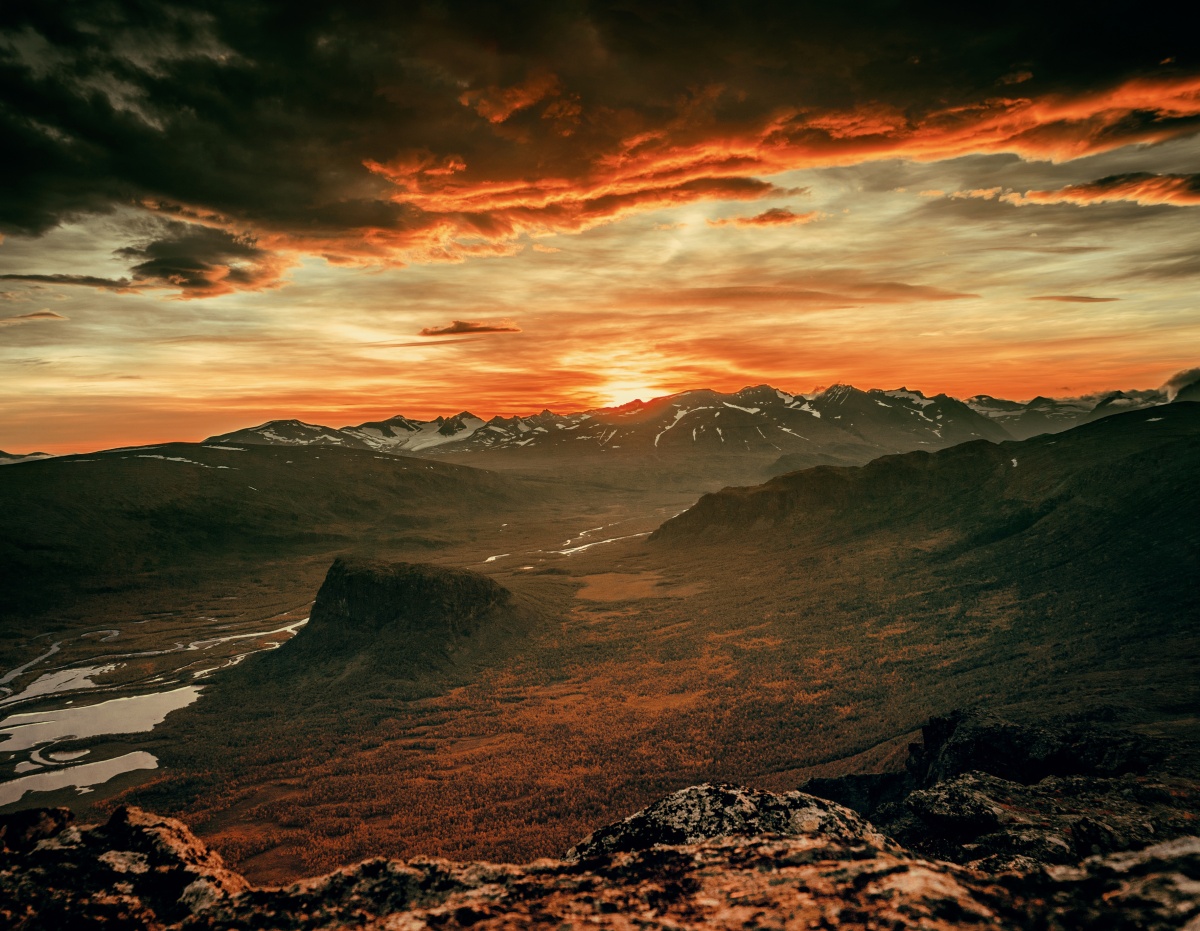 Photo of sunset from top of Skierfe cliff in Northern Sweden