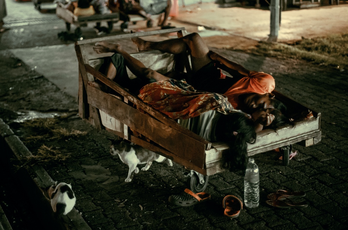 Photo of two women sleeping in cart